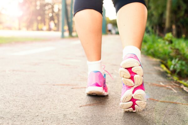 photo of a woman in running shoes