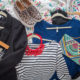 photo of clothes on a bed